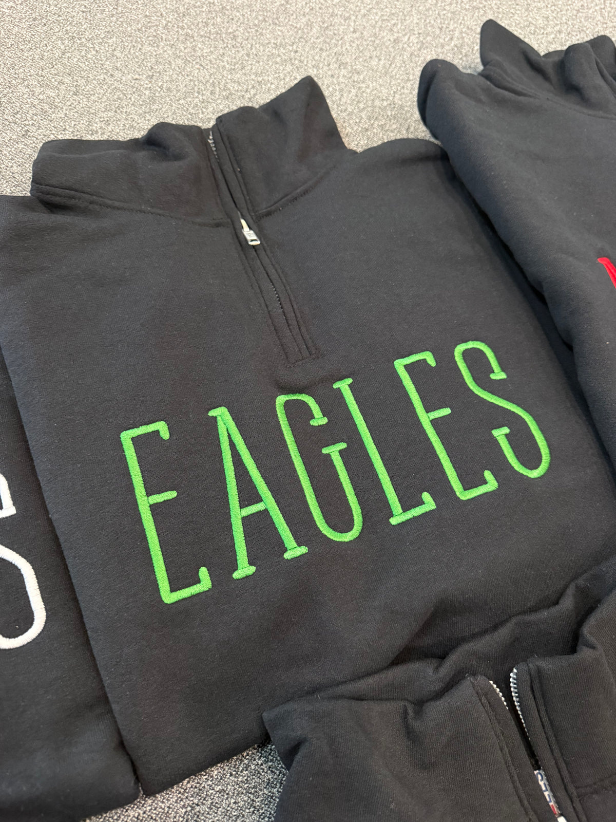 Embroidered black 1/4 zip